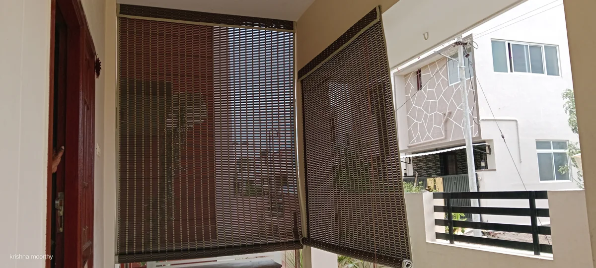 Outdoor blinds across a covered balcony